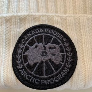 Mens Canada Goose Black Label hat. Cream color with black Canada Goose log.